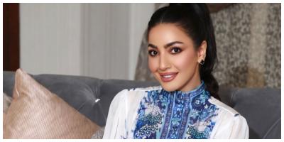 دونا الحسين تتألق بفستان ابيض ملوكي في حفل زفافها